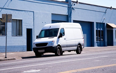Van in front of building